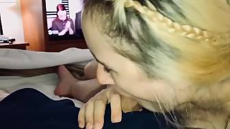 lighthaired blowjob watching tv